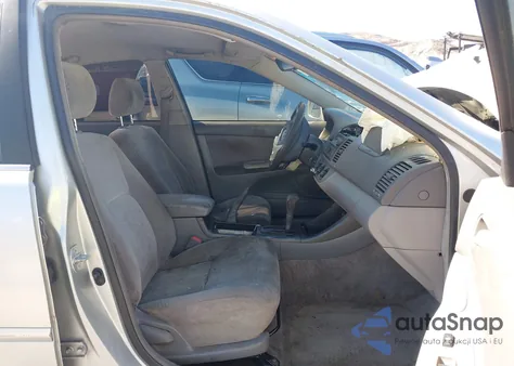 2003 Toyota Camry Le z USA, uszkodzony, nr VIN JTDBE32KX30154150